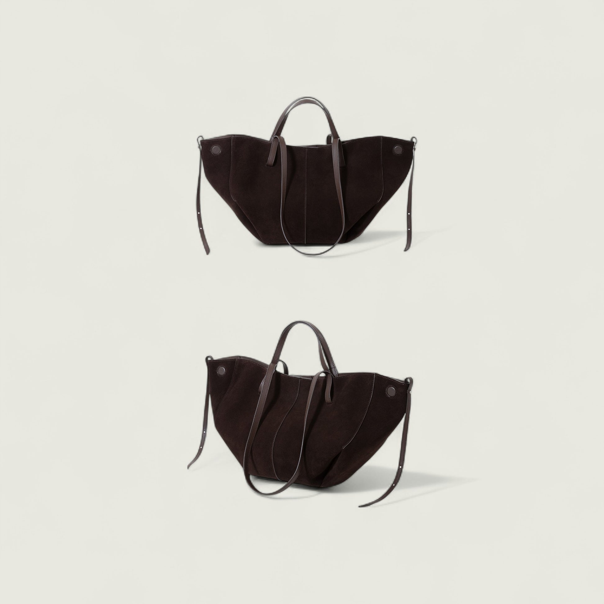 Two black handbags on a light gray background