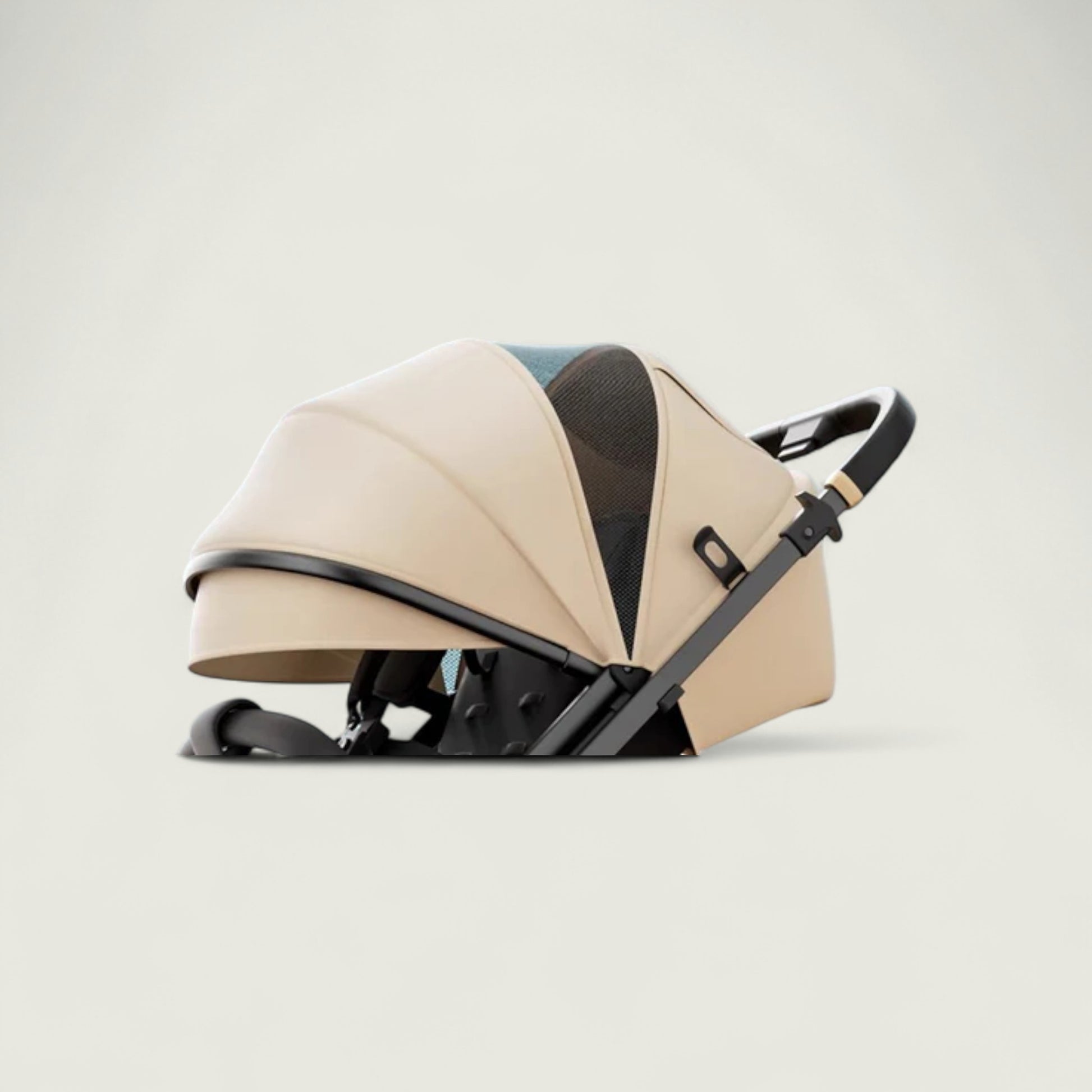 Beige baby stroller with black accents on a light gray background