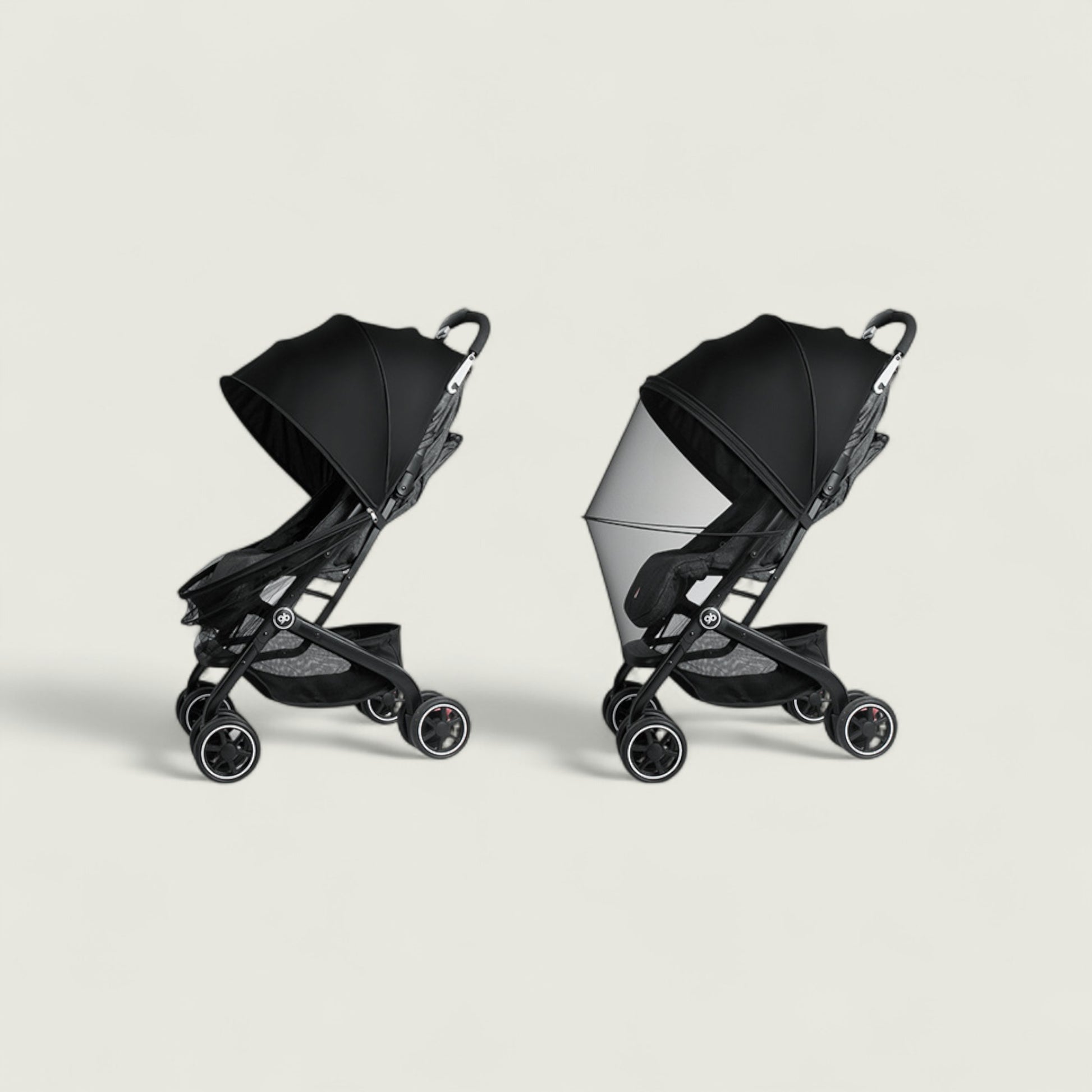 Two black strollers on a light gray background