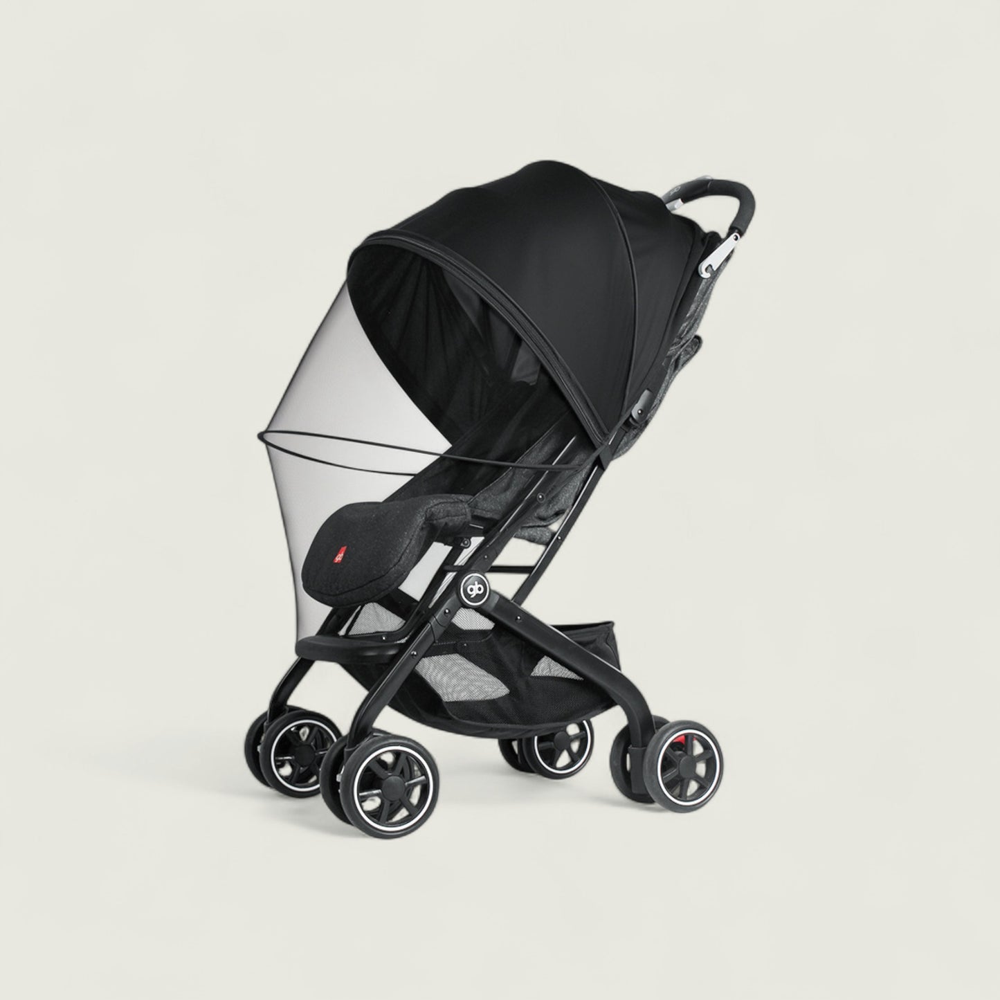 Black stroller with transparent canopy on a light gray background