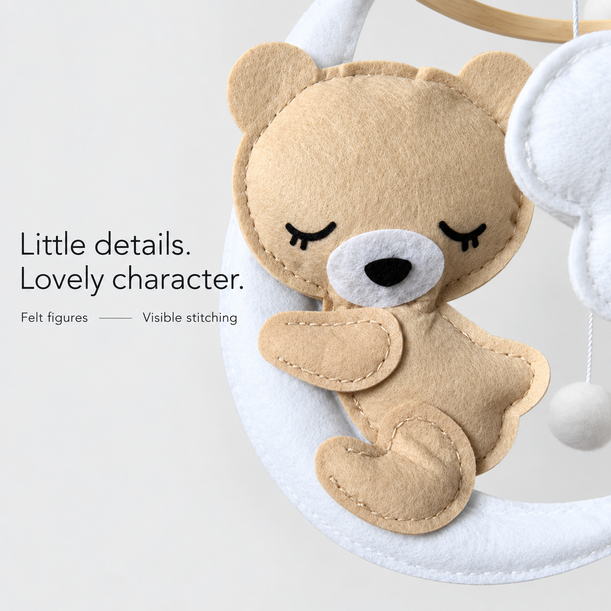 Bear on the Moon — close-up of the felt bear and visible stitching