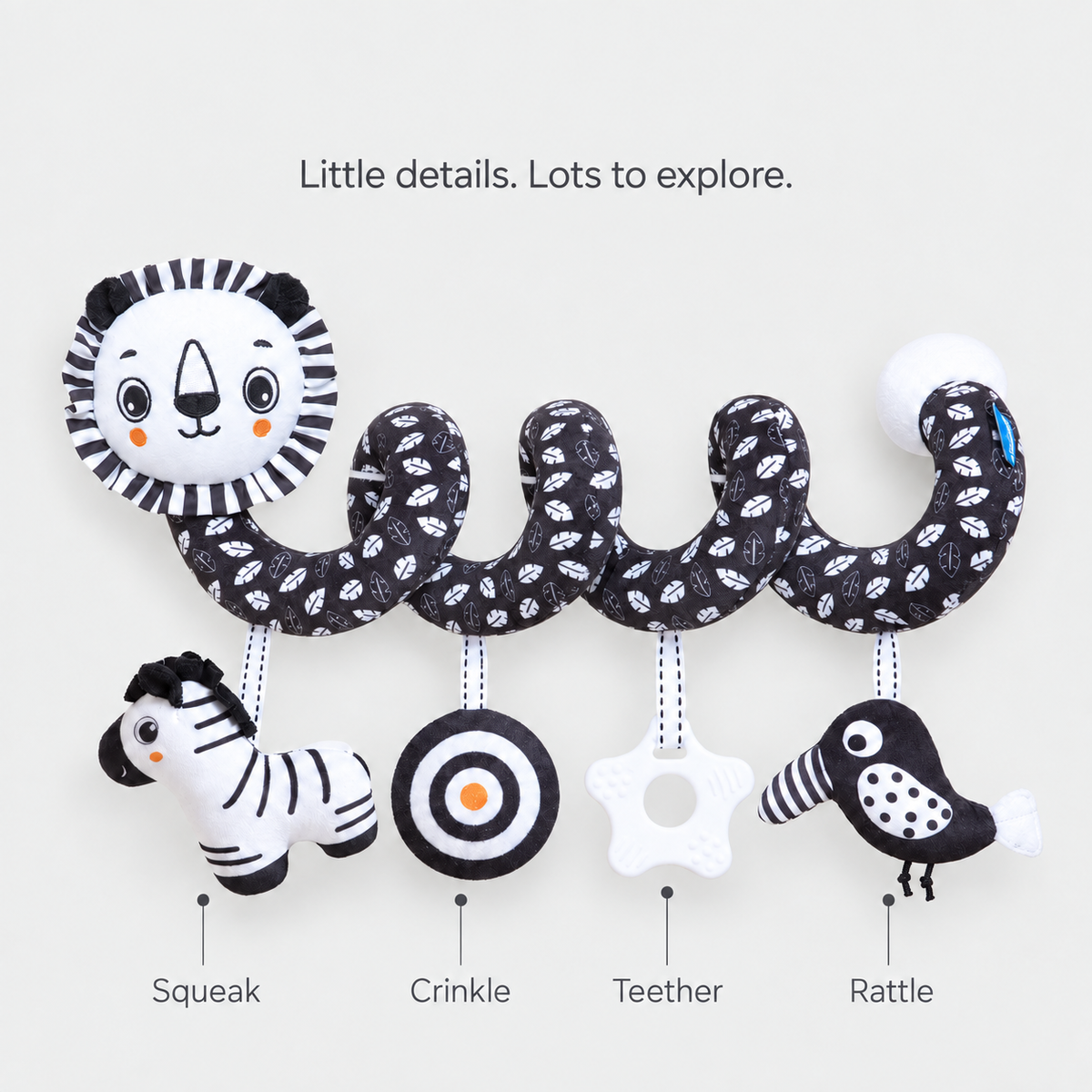 Lion spiral toy details: squeaking zebra, crinkle disc, star teether and rattling bird.