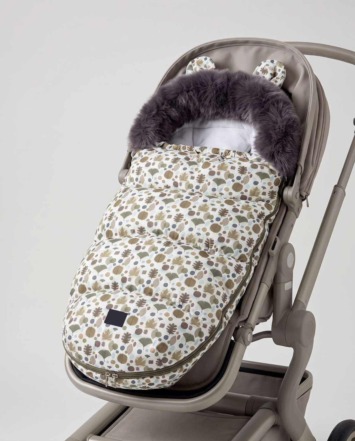 PerfectBaby footmuff in Colorful Green shown fitted in a stroller seat