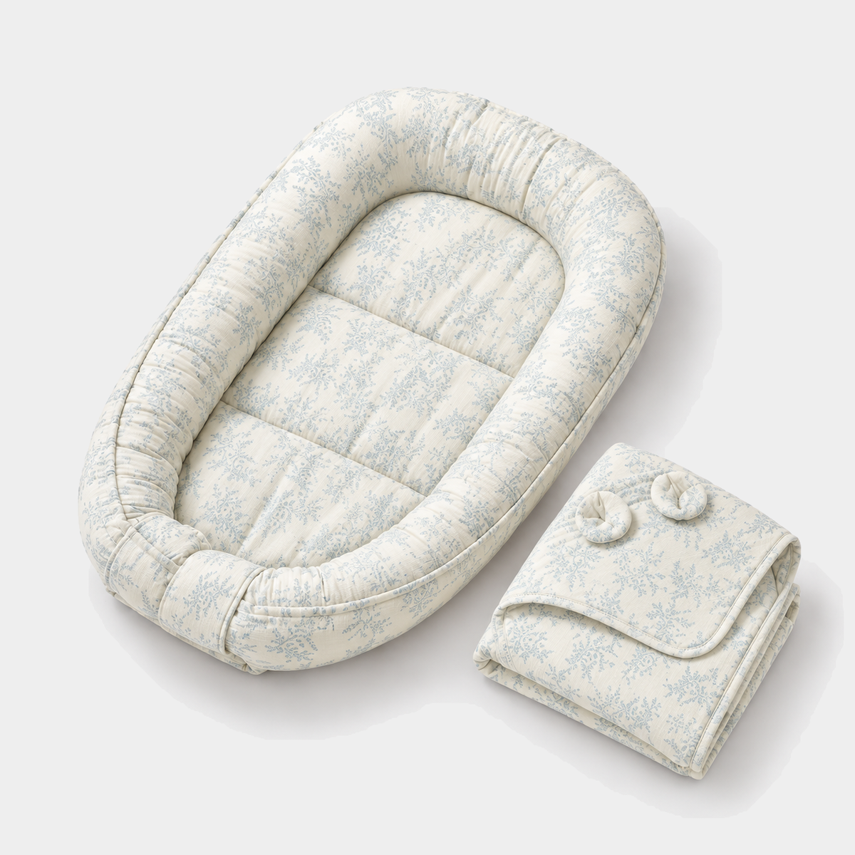 Green Leaves muslin nest and matching folded hooded blanket