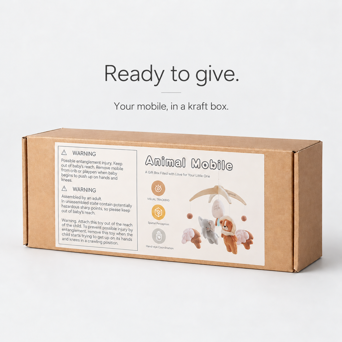 Elephant & Lion plush mobile — actual kraft box packaging, ready to give.