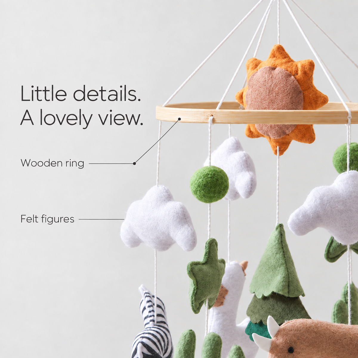 Sun Forest felt mobile — felt figures and wooden ring details
