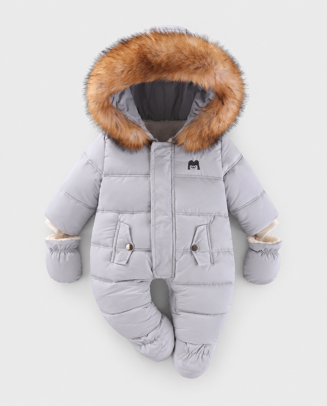 Arctic Cloud grey baby snowsuit with fur-trimmed hood and mittens on a light grey studio background