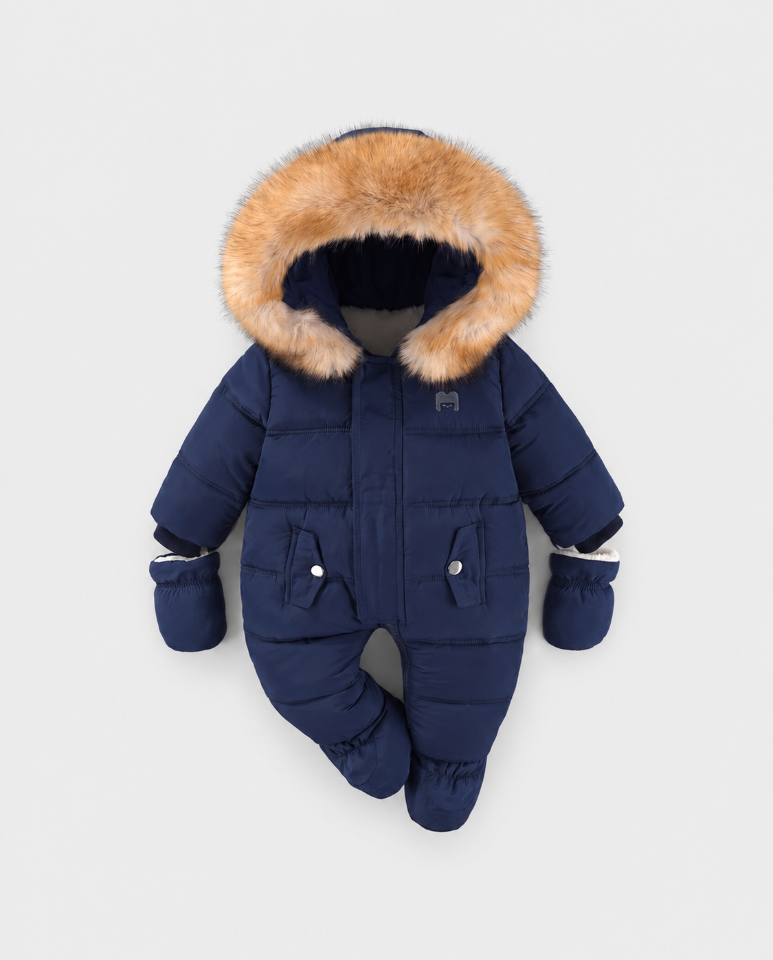 Arctic Cloud navy blue baby snowsuit with fur-trimmed hood and mittens on a light grey studio background