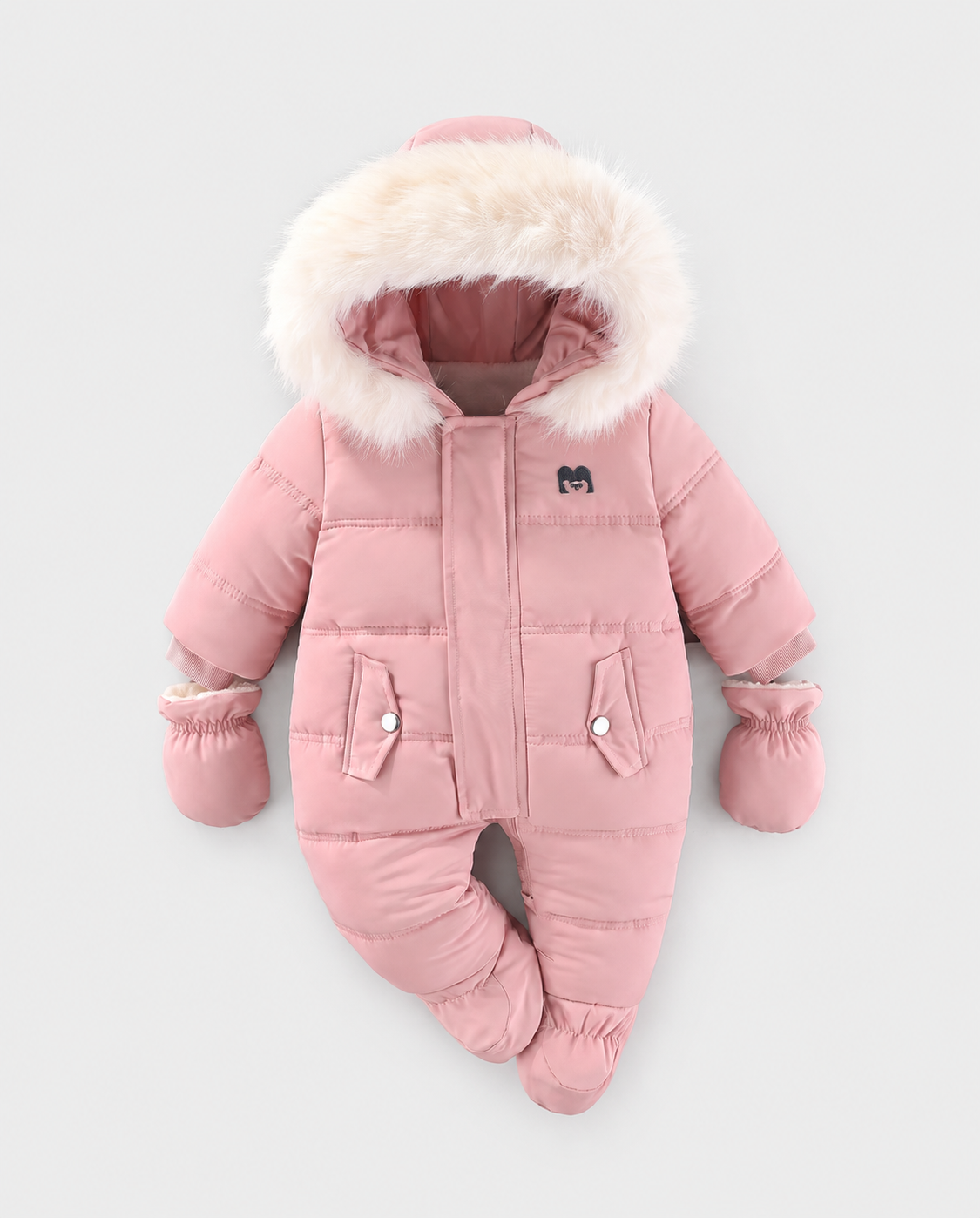 Arctic Cloud pink baby snowsuit with fur-trimmed hood and mittens on a light grey studio background