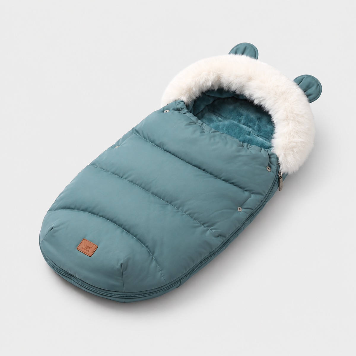 BearWarm Dusty Teal stroller footmuff, diagonal studio view on neutral grey background