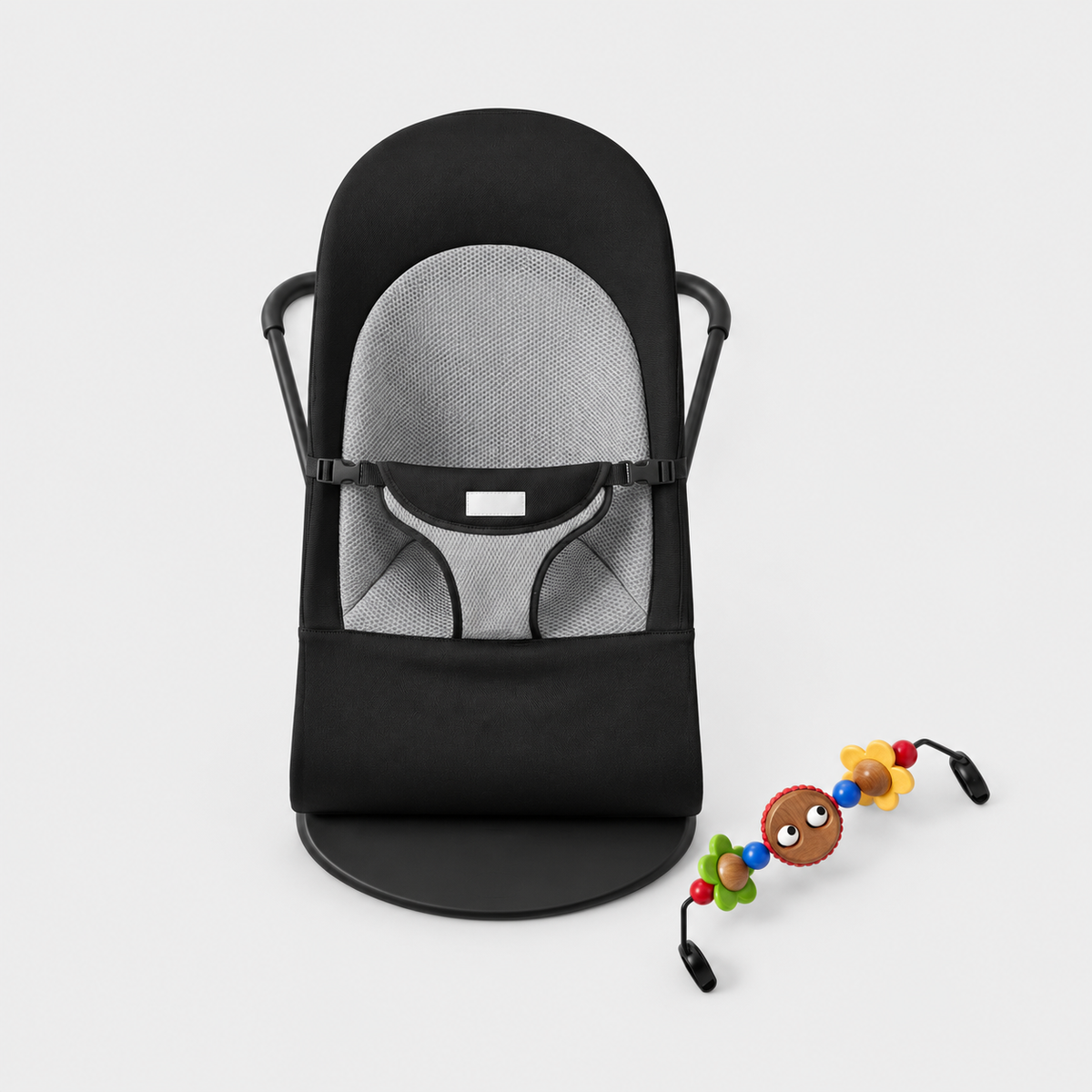 Comfort Rocker in Black with included colourful toy bar