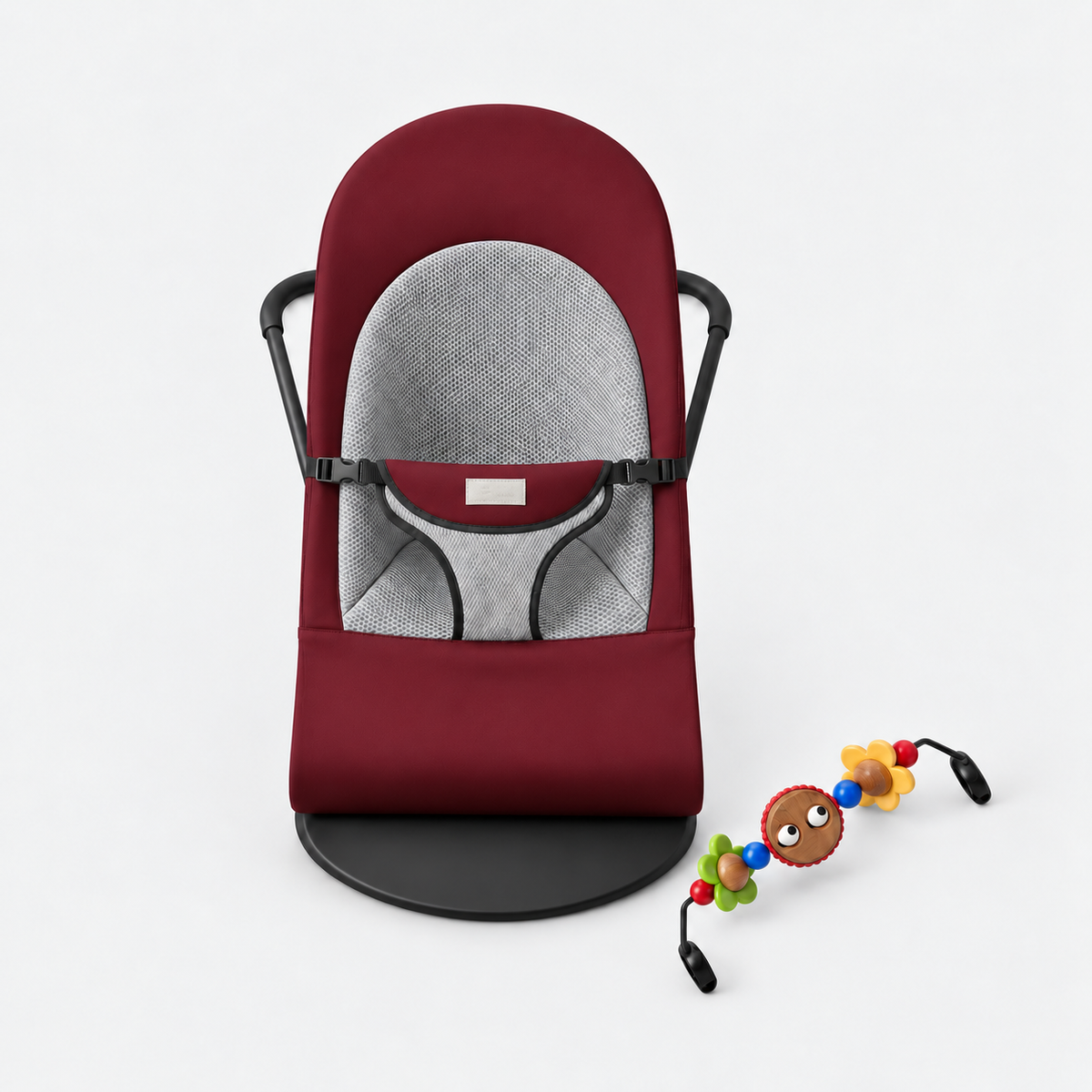Comfort Rocker in Burgundy with included colourful toy bar