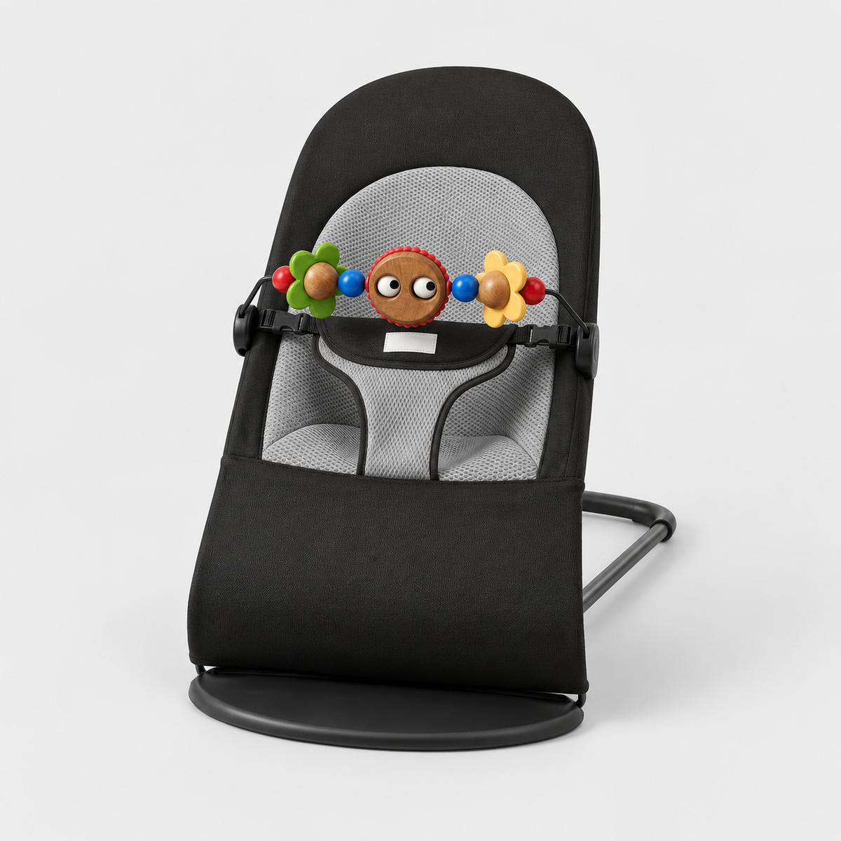Black Comfort Rocker with colourful toy bar attached