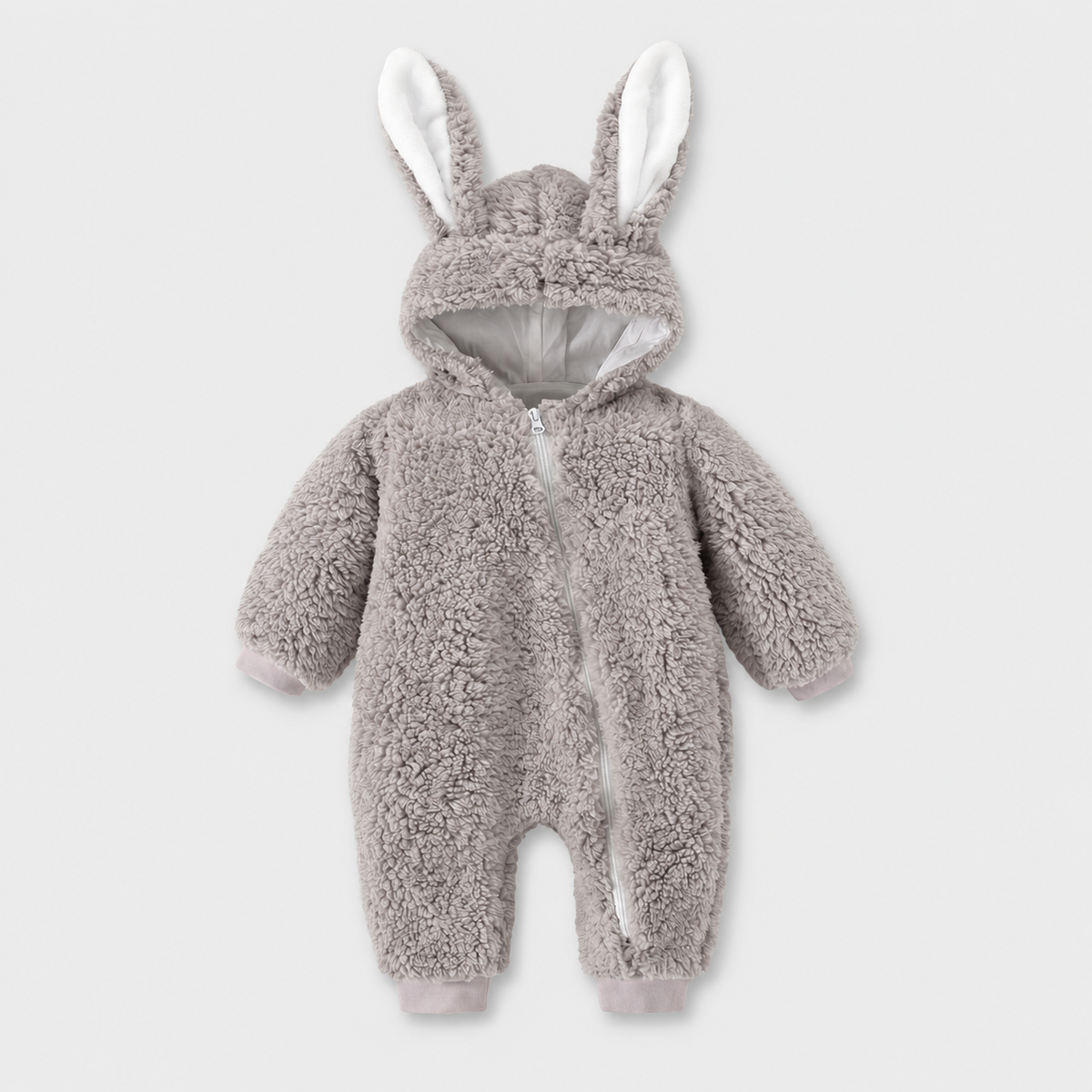 Cozy Bunny grey fleece romper with long bunny ears and diagonal zip on a light grey studio background