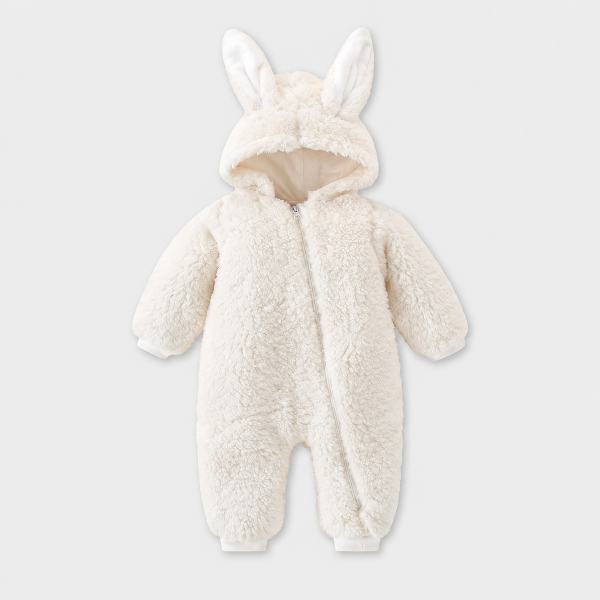 Cozy Bunny white fleece romper with long bunny ears and diagonal zip on a light grey studio background