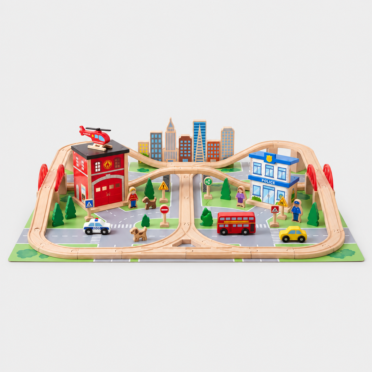 Deluxe Wooden Train city playset with raised tracks, buildings and vehicles on a light grey studio background