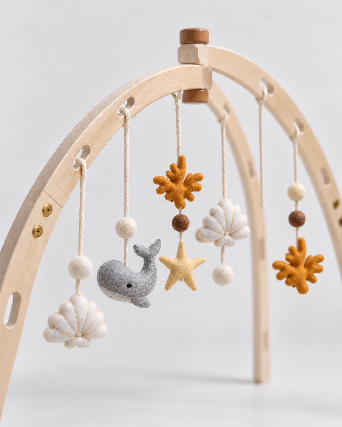 PerfectBaby Dream Arch Undersea Paradise toys hanging on curved wooden arch