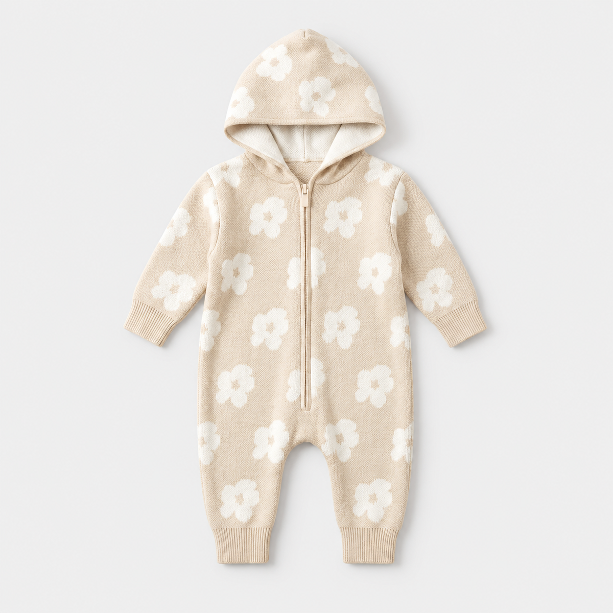 PerfectBaby Flower Knit Romper in beige, hooded floral knit romper on a light grey studio background