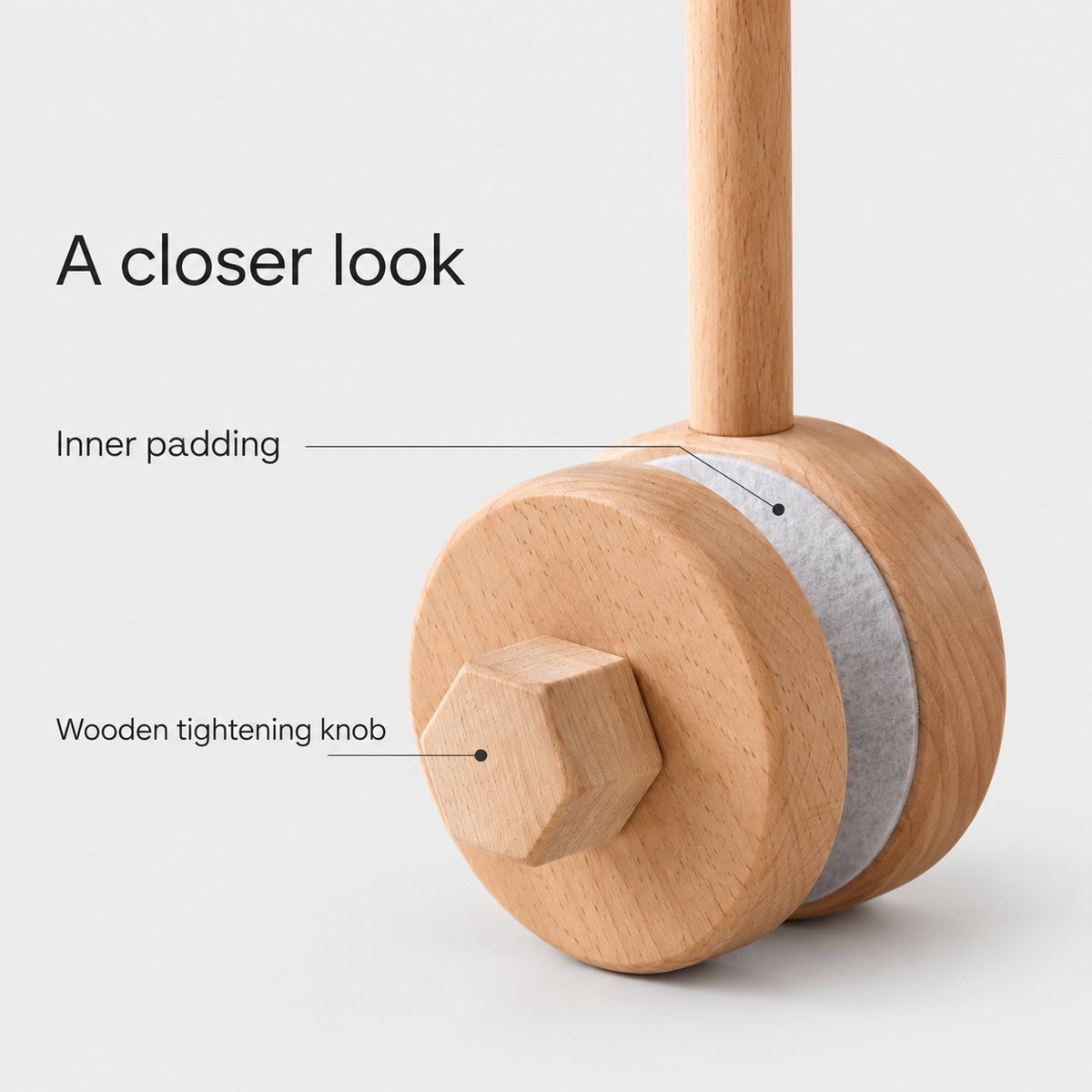 Aura360Loom round clamp detail showing inner padding and wooden tightening knob