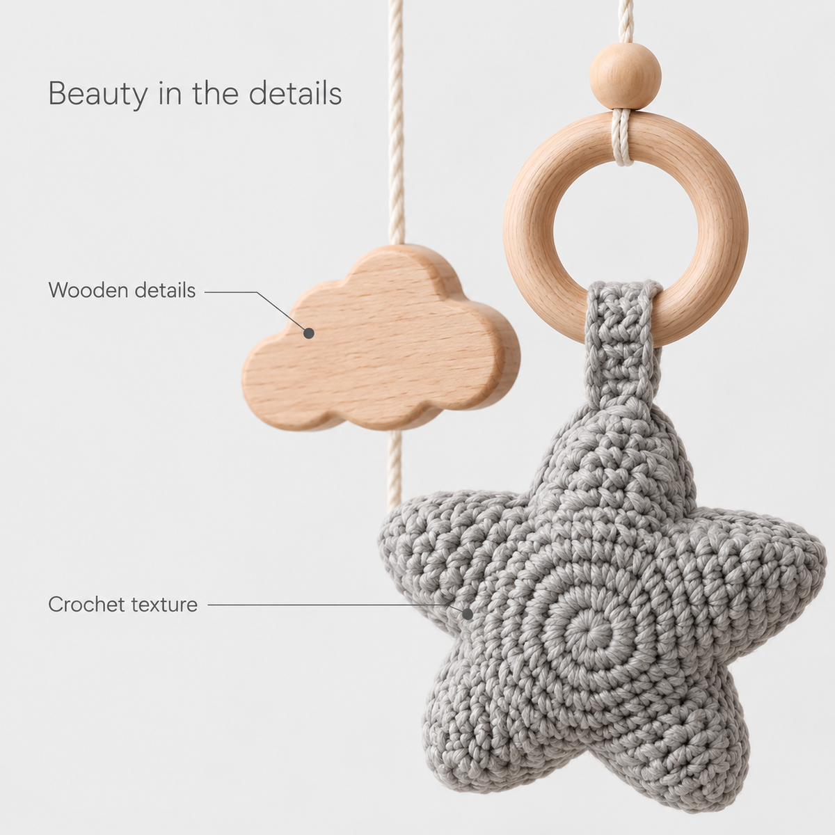 Moonveil grey mobile: crochet star texture and wooden details close up