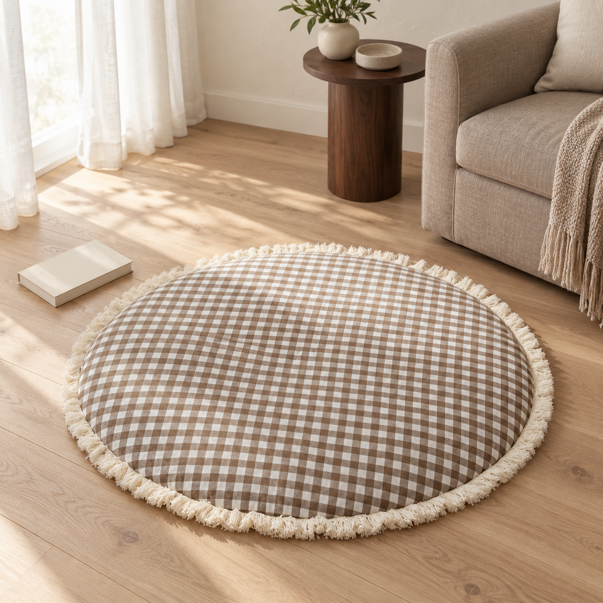 Brown gingham play mat on an oak floor in a neutral room