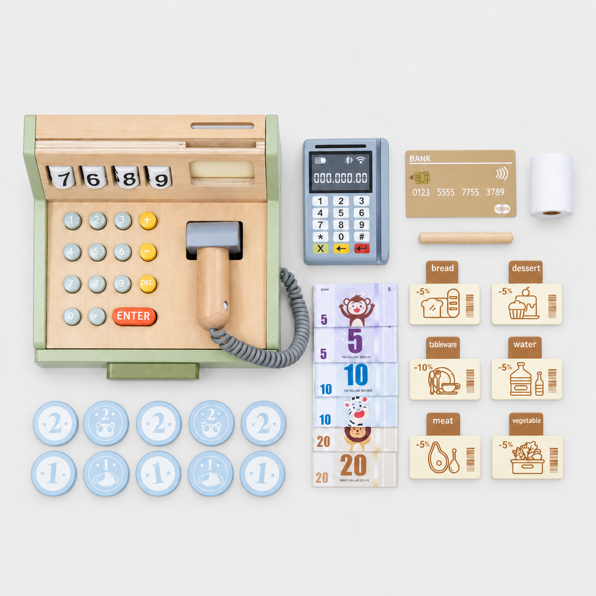 Wooden cash register set with pretend scanner, one card terminal, play money and category cards on a grey studio background