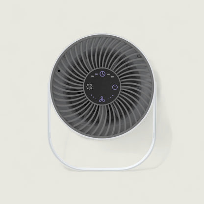 Portable fan with a black fan blade and white base on a light gray background