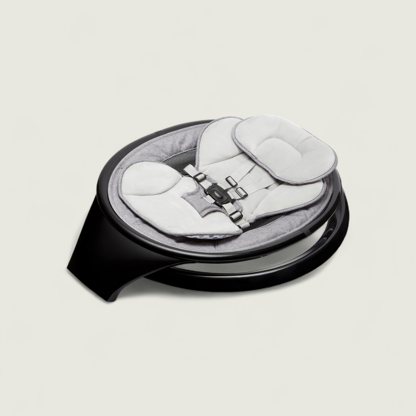Baby seat with black base on a light gray background