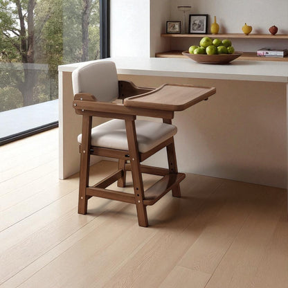 Wooden high chair with white cushion in a modern kitchen setting