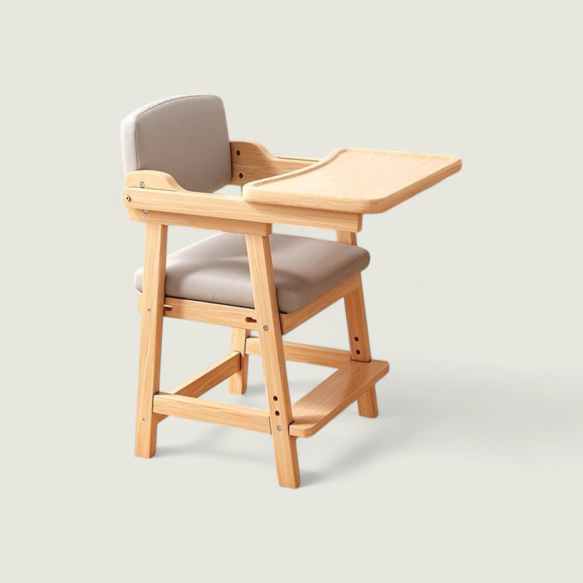 Wooden high chair with a gray cushion on a light gray background