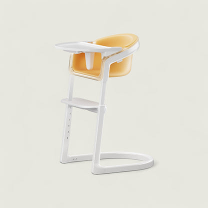 White high chair with yellow seat on a light gray background