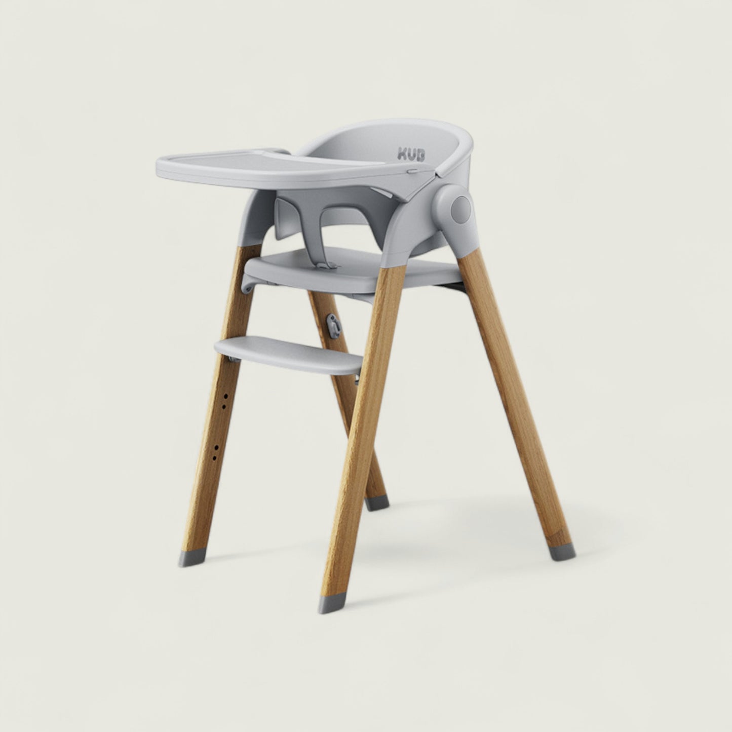 Gray high chair with wooden legs on a light background