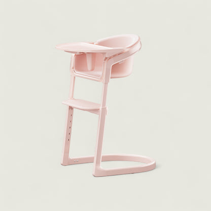 Pink high chair on a light gray background