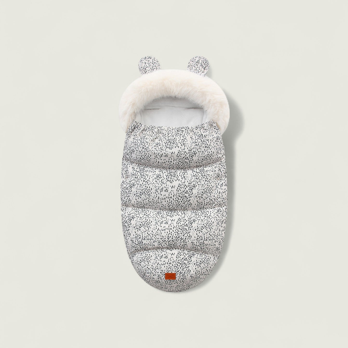 Gray puffer bag with white fur trim on a light gray background