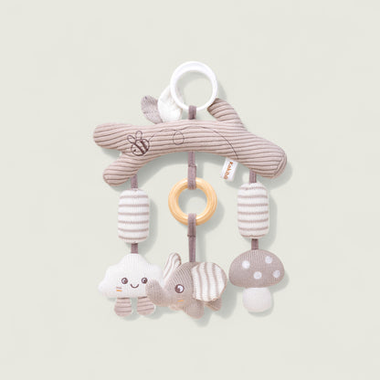 Baby mobile with soft textures and shapes on a light background