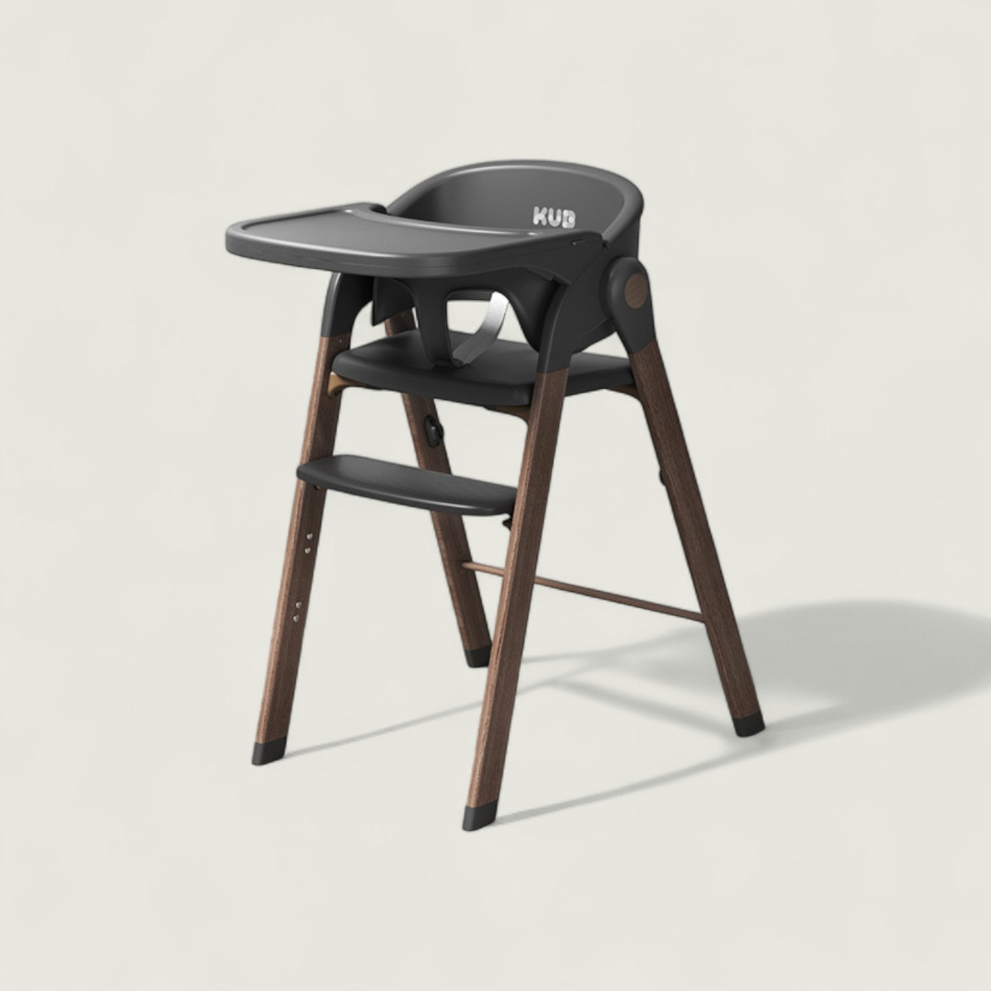 Black high chair with wooden legs on a light gray background
