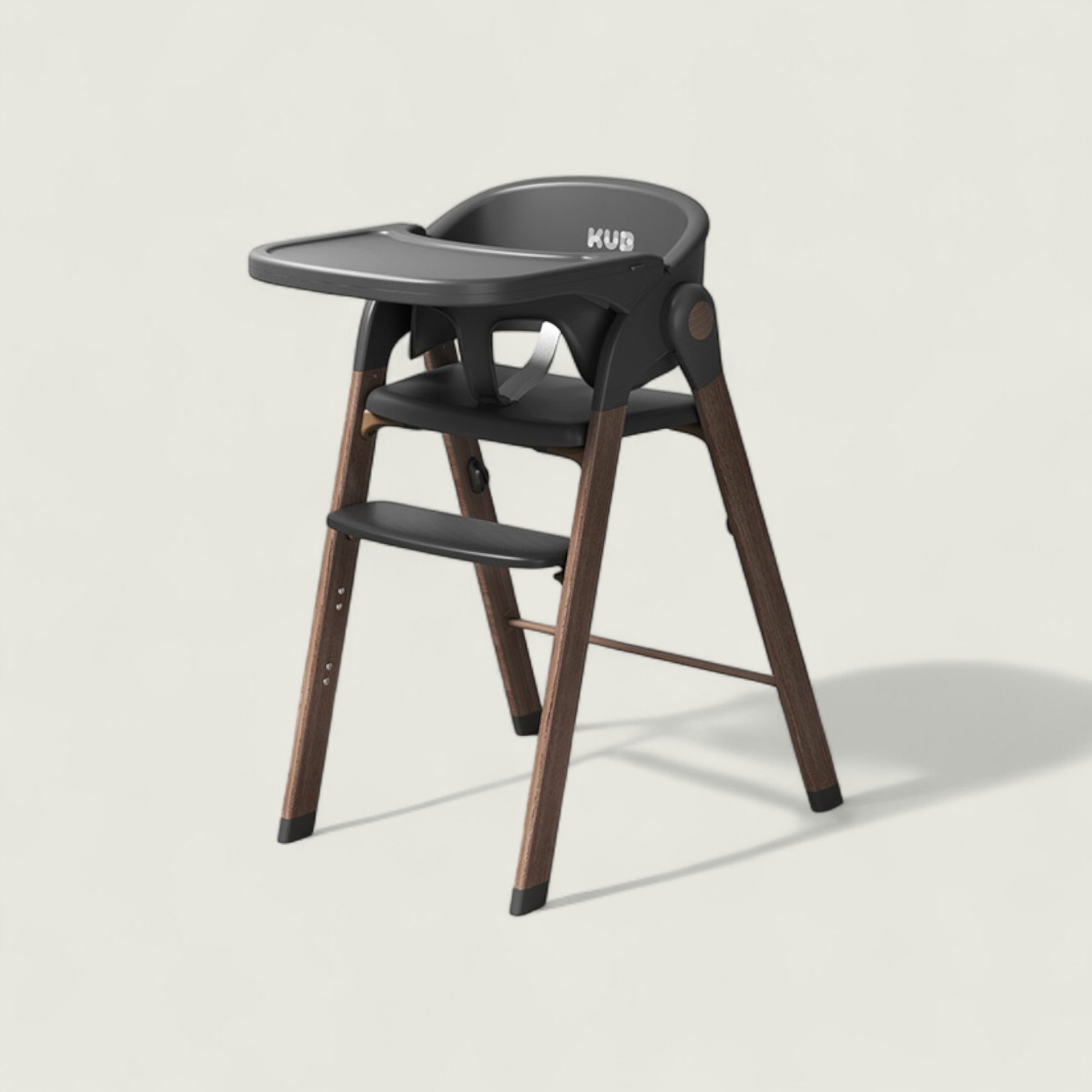 Black high chair with wooden legs on a light gray background