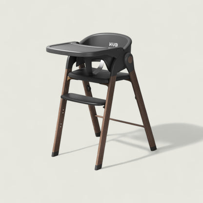 Black high chair with wooden legs on a light gray background