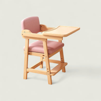 Wooden high chair with pink cushion on a light gray background