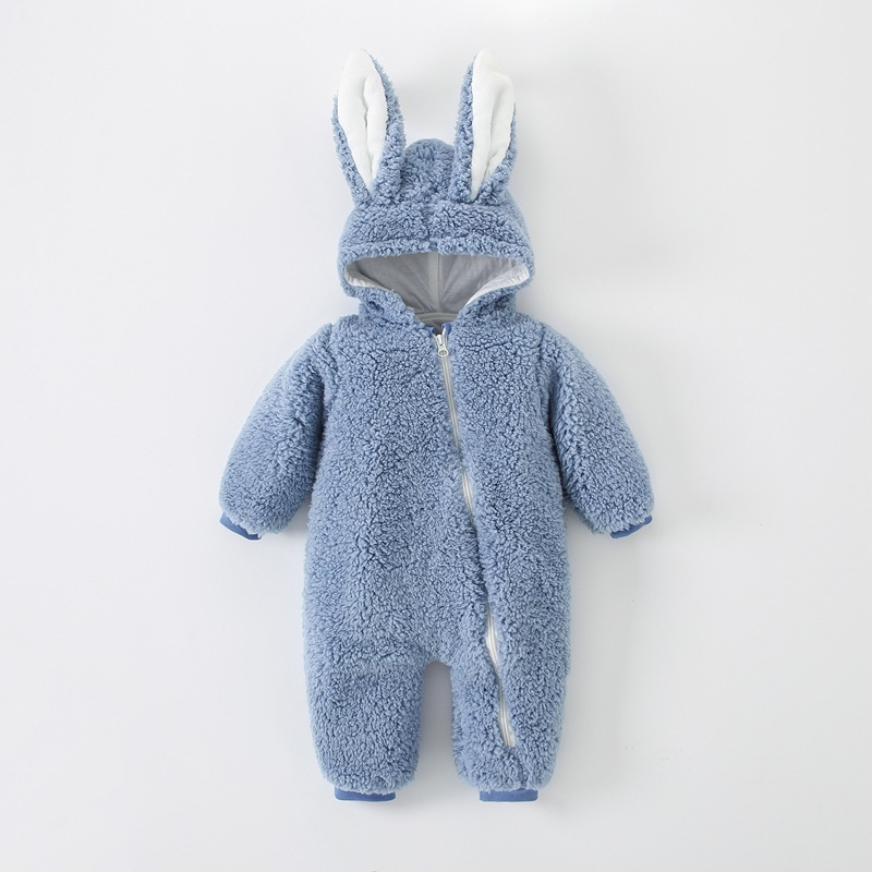 Blue baby onesie with bunny ears on a white background