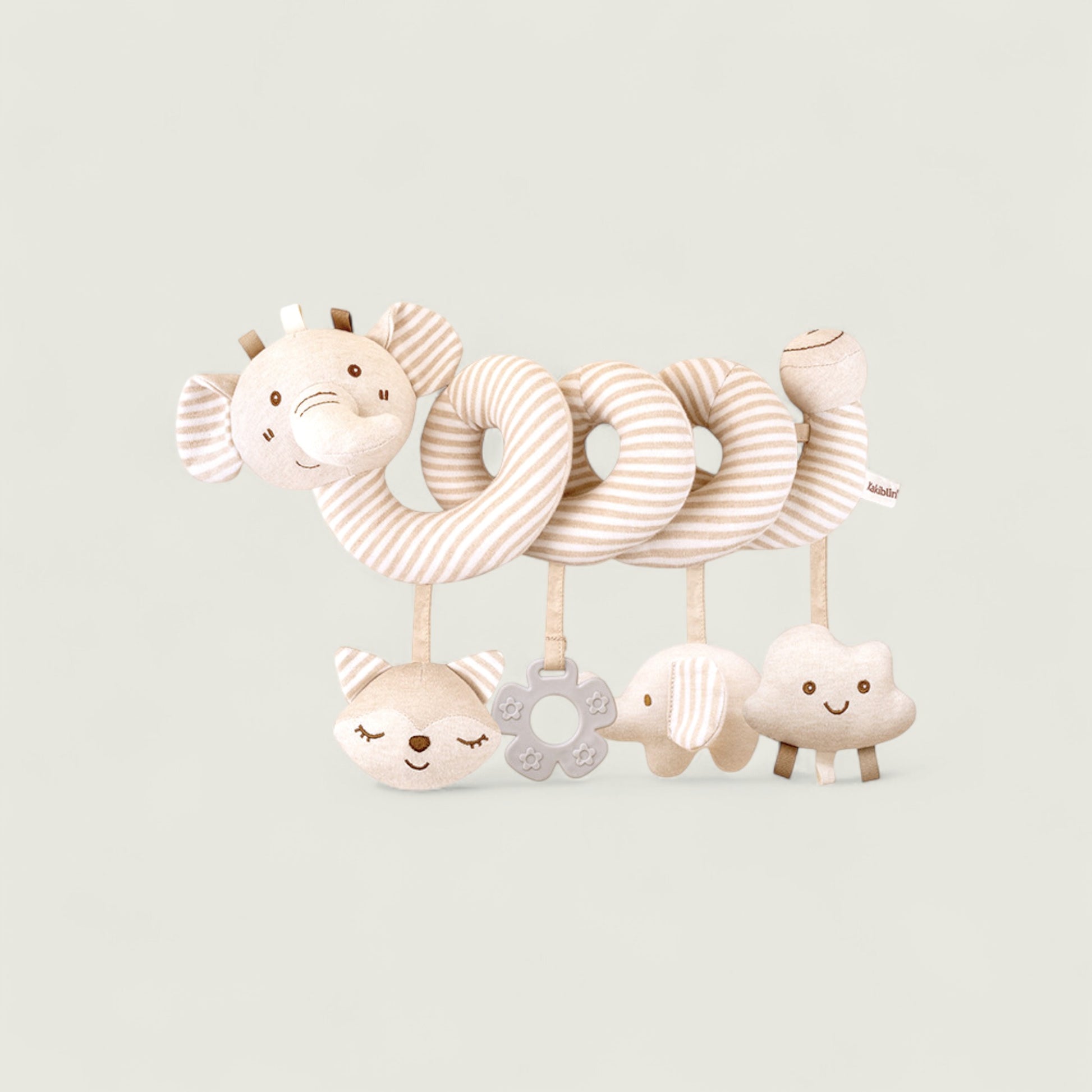 Baby toy with animal faces and rattles on a light background