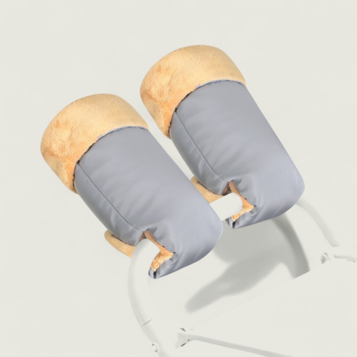 Pair of cork and gray earbuds on a light gray background