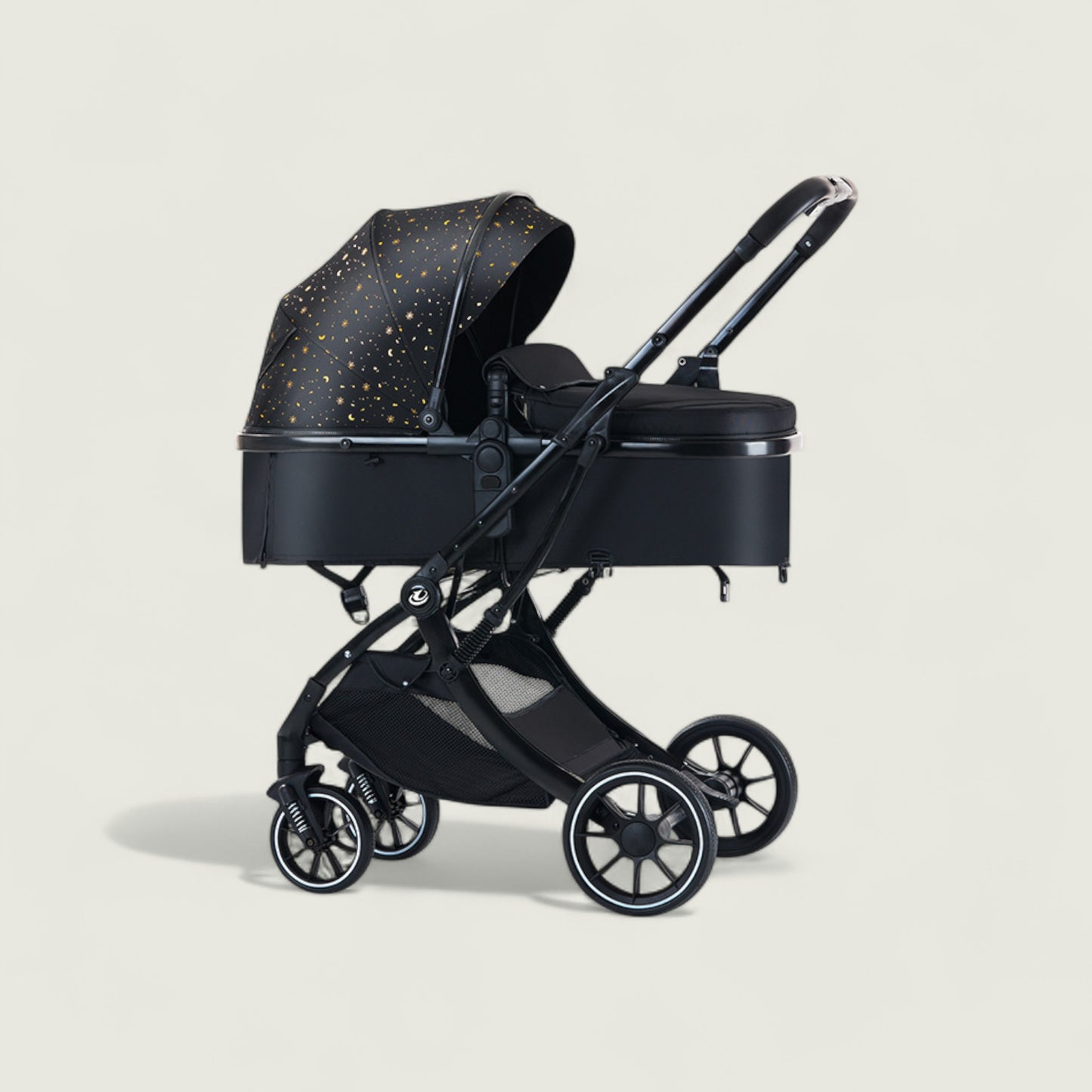 Black baby stroller with star-patterned canopy on a light beige background