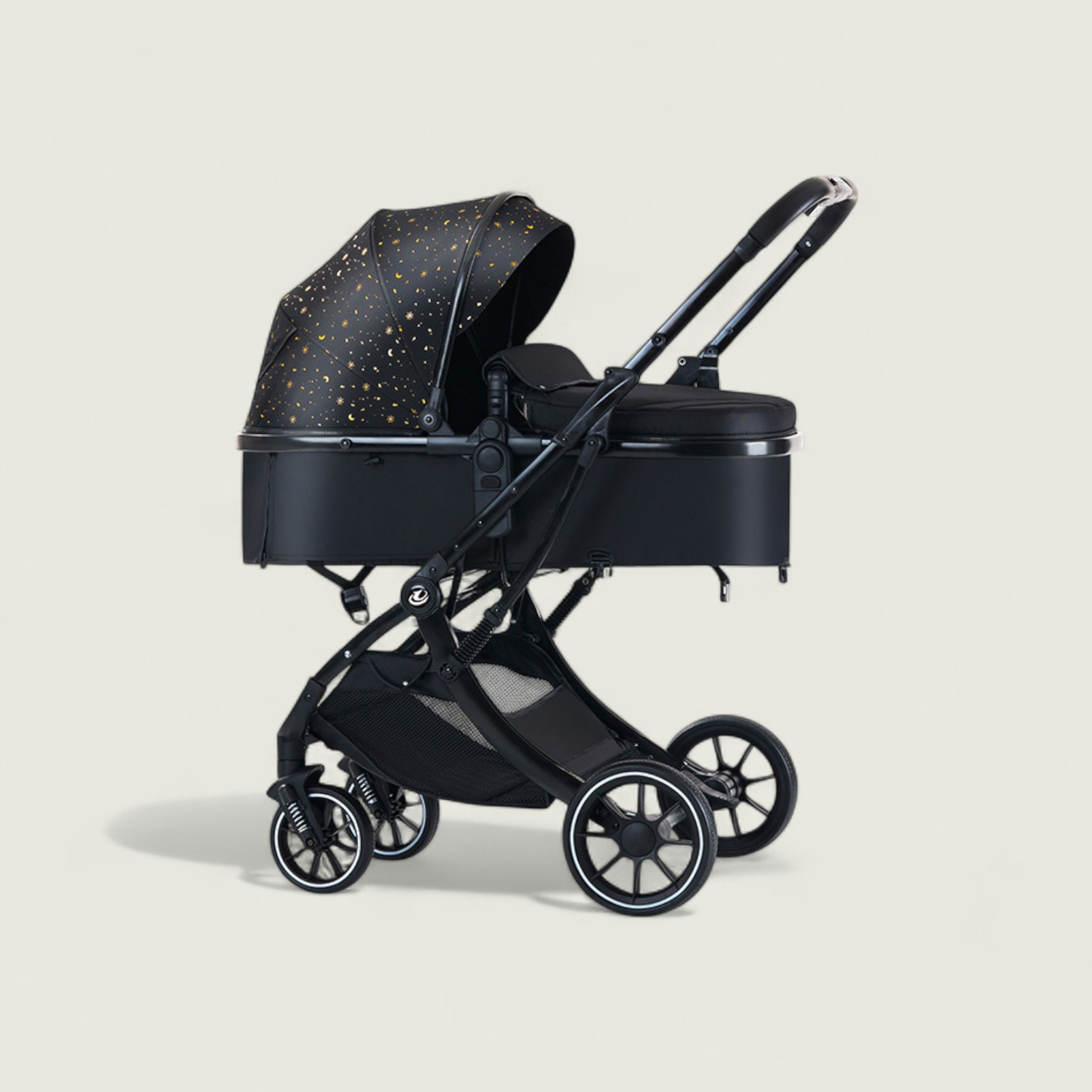 Black baby stroller with star-patterned canopy on a light beige background