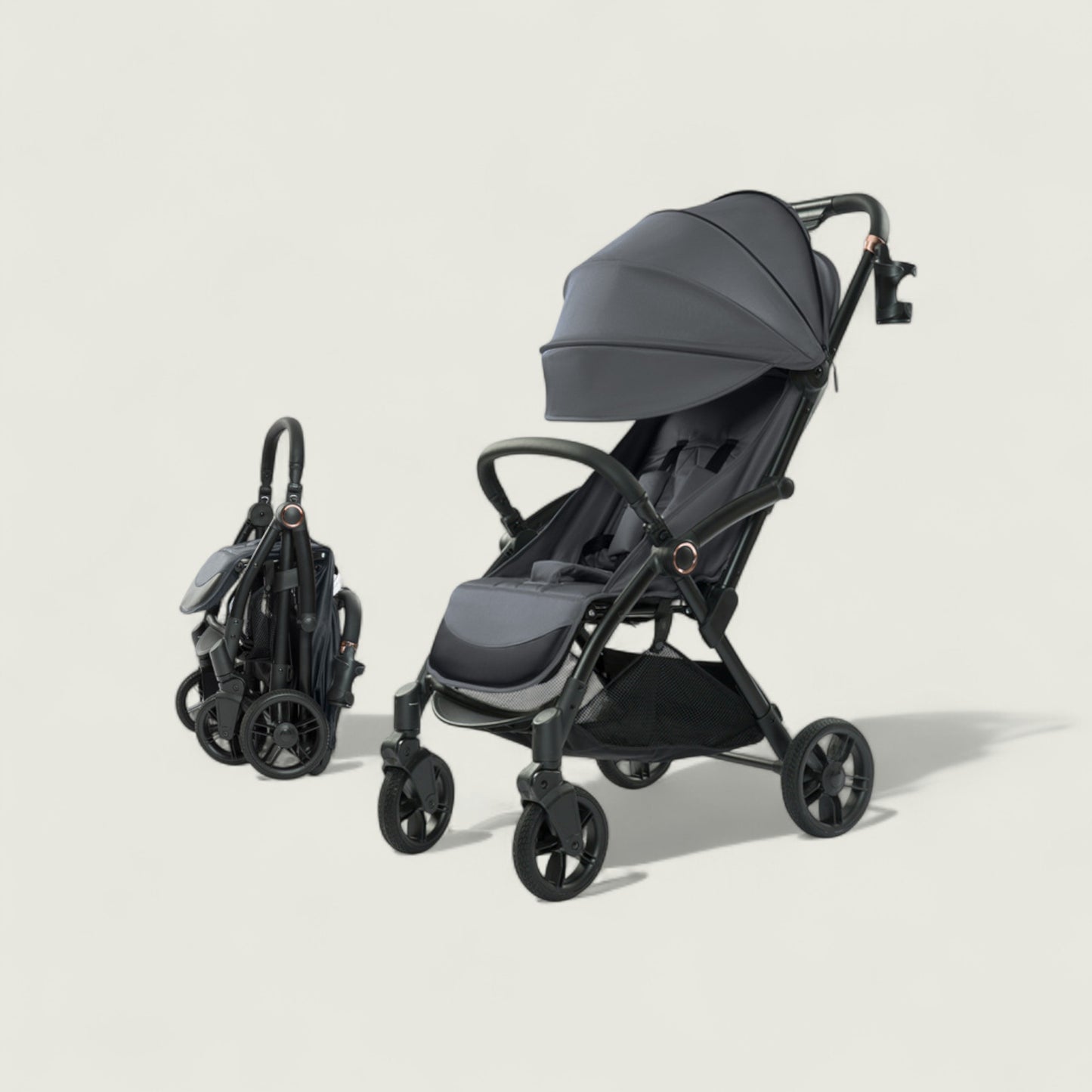Black and gray stroller on a beige background