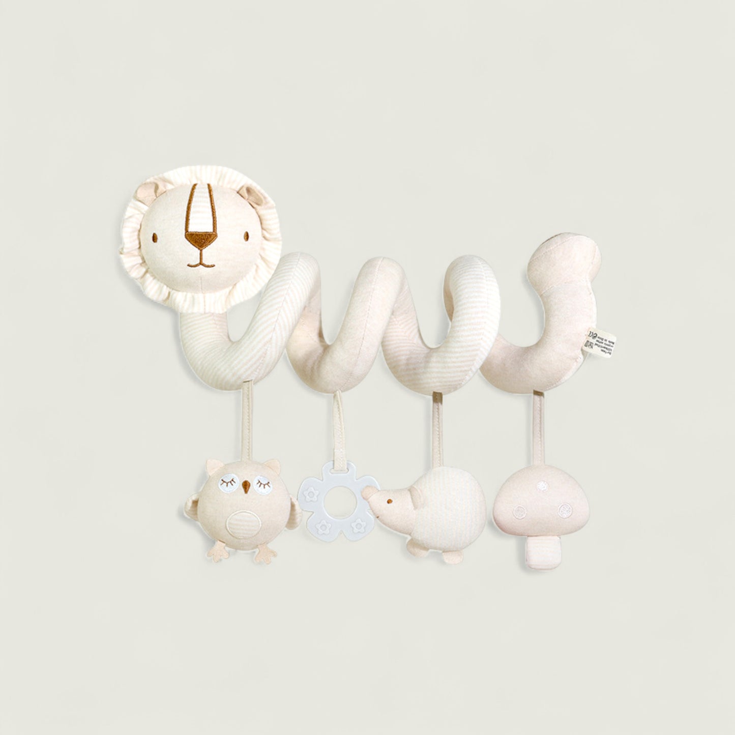 Children's toy with lion, bear, and bird designs on a light gray background