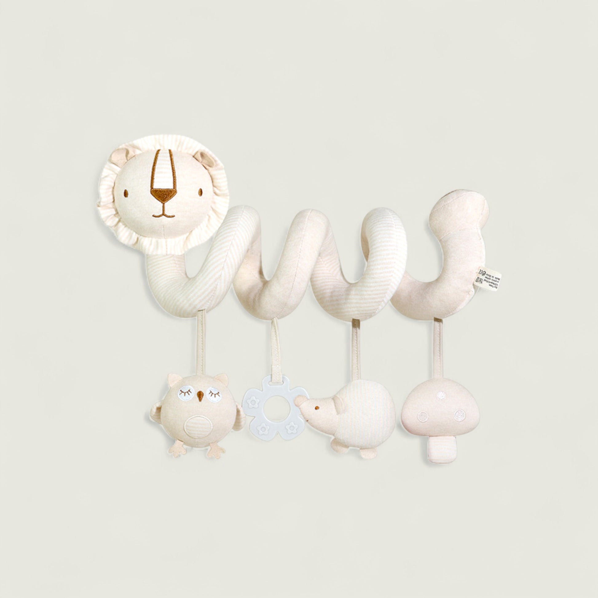 Children's toy with lion, bear, and bird designs on a light gray background